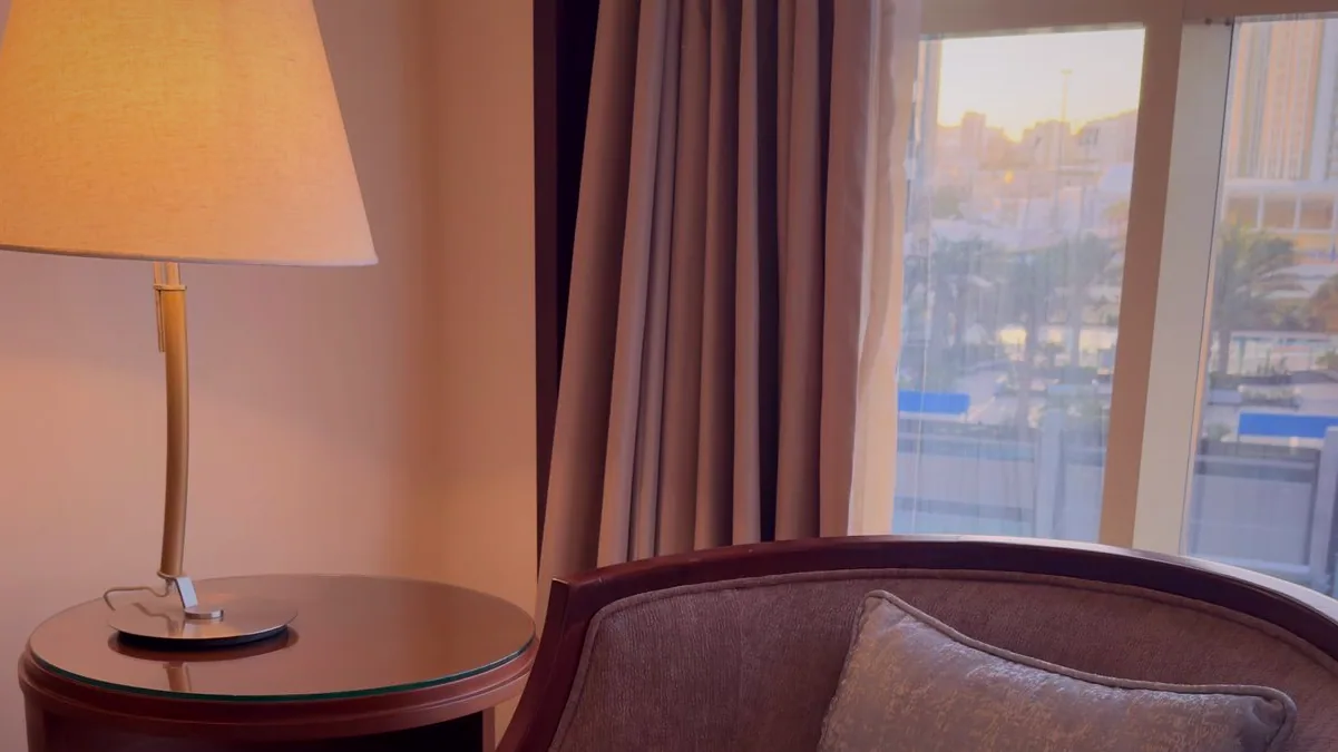 A reading corner off the card room, two armchairs set beside a low table